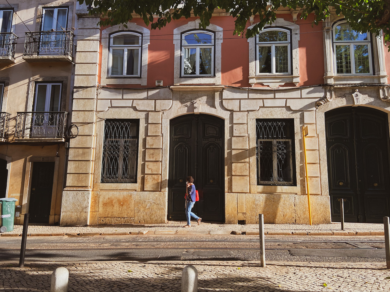 A woman walking in the morning in Lisbon, Portugal