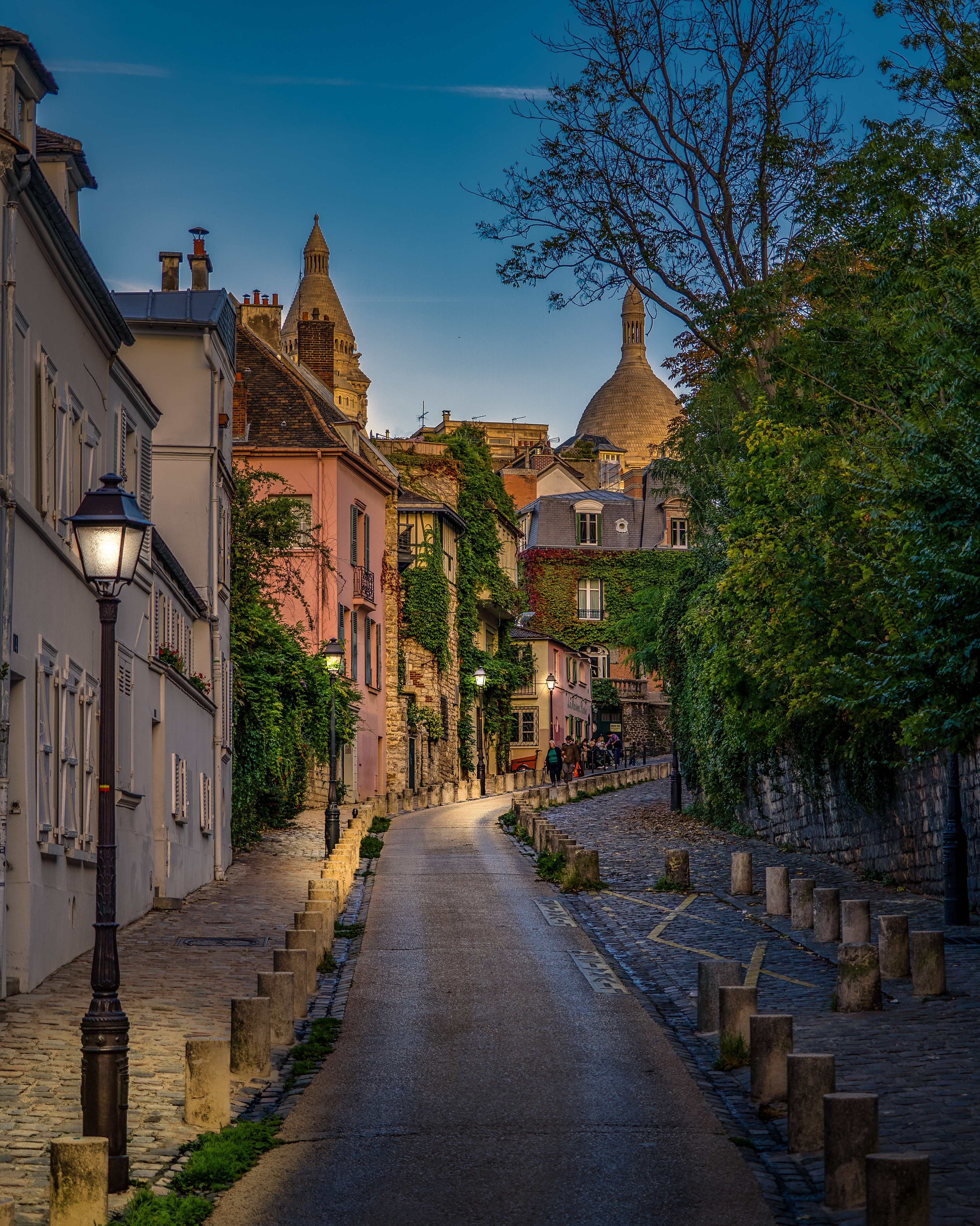 street near sacre coeur in paris sunset summer