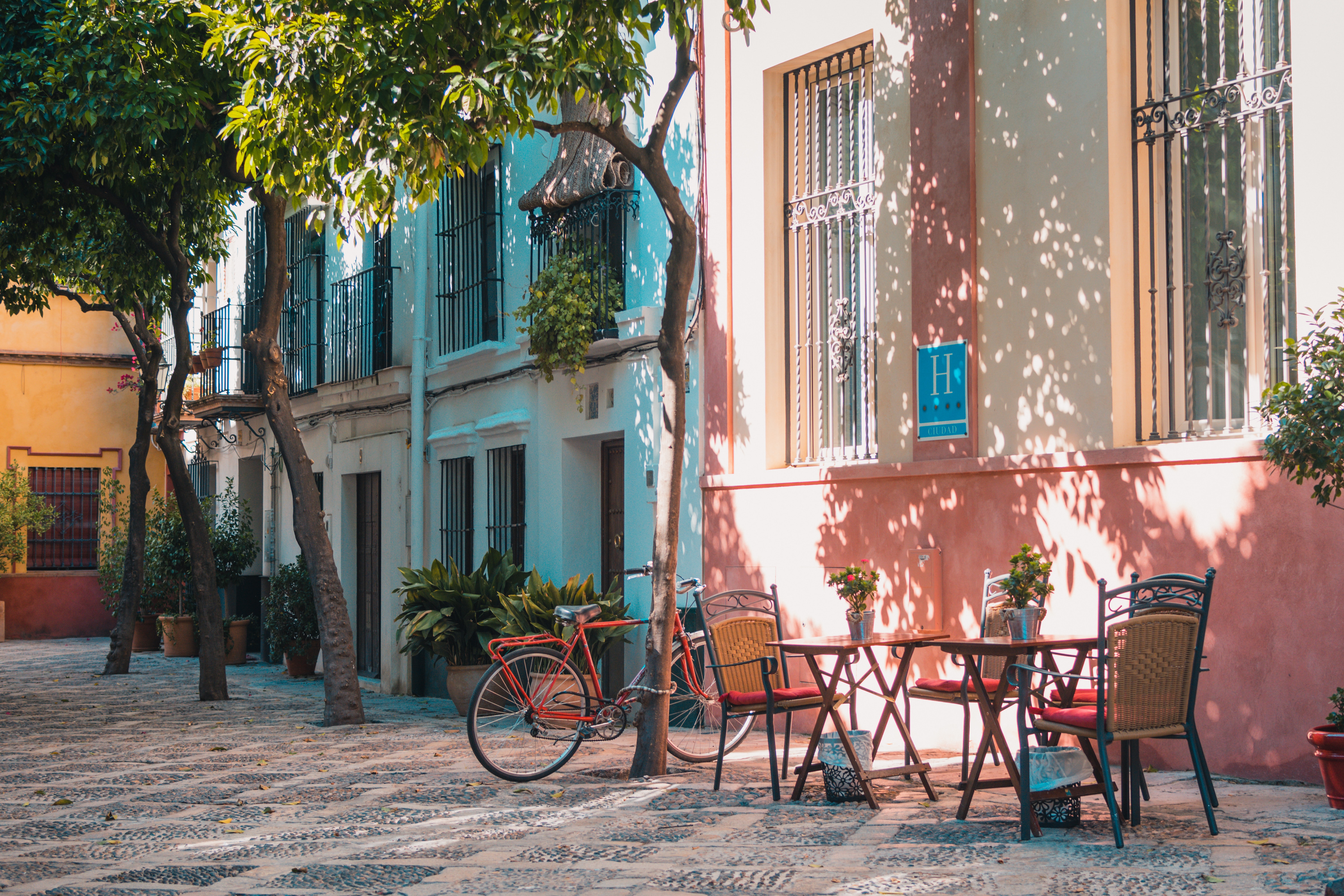 street with bike and beautiful blue white and orange houses